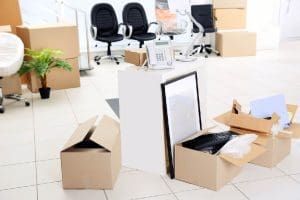 boxes in a room with a telephone and a telephone